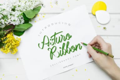Asturo Ribbon Font by soloart61 — Script Handwritten Font — thumbnail 1